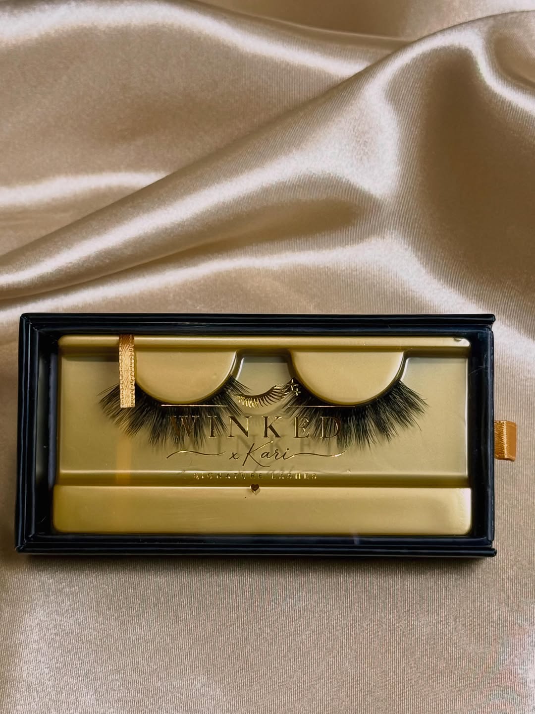 Cashmere eyelashes in Winked x Kari product packaging