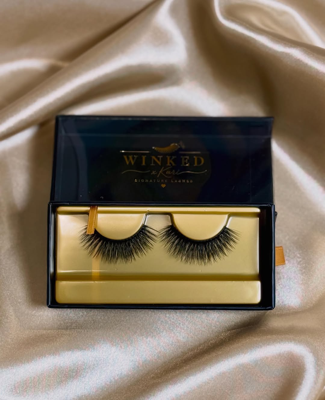 Icon strip lashes from Winked x Kari in their signature box